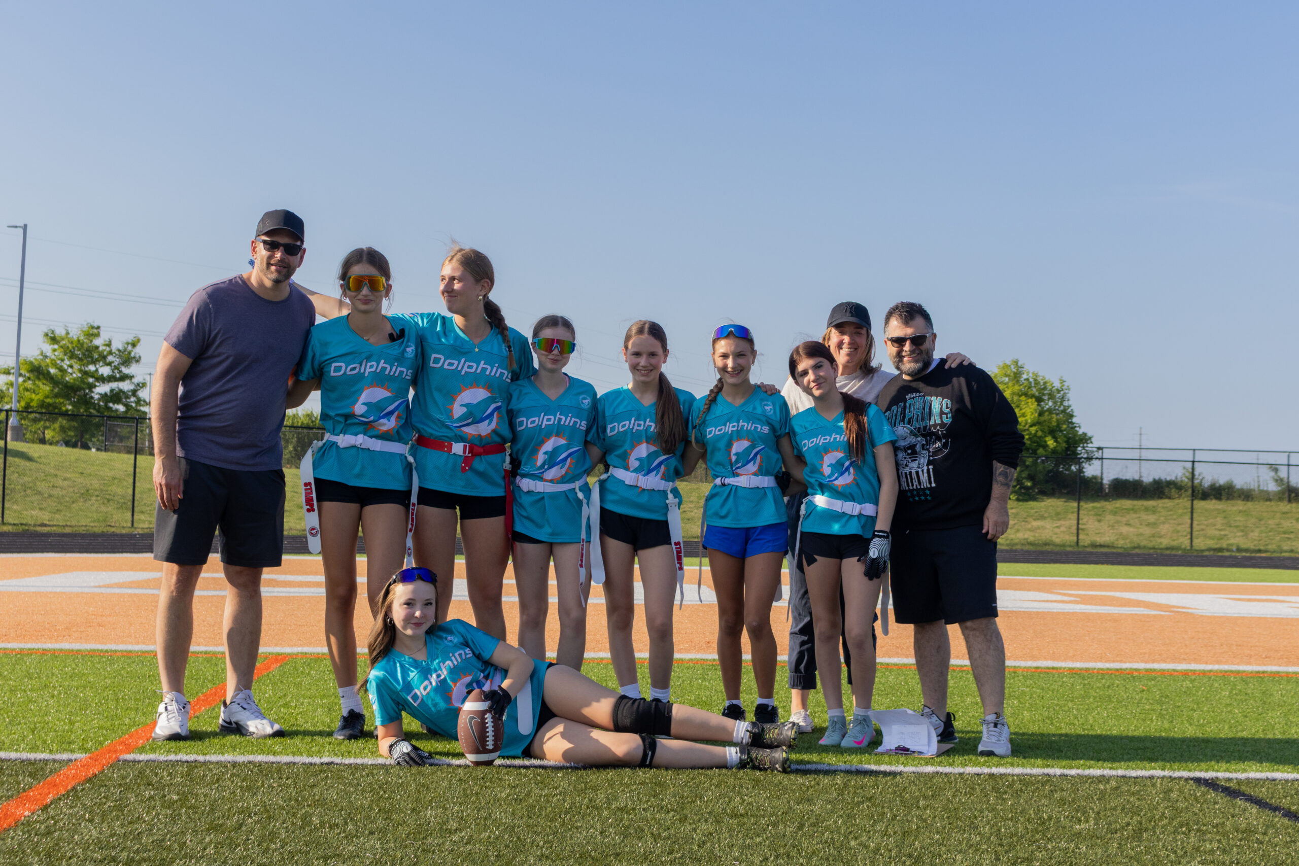BMFA flag football athletes celebrating on the field.